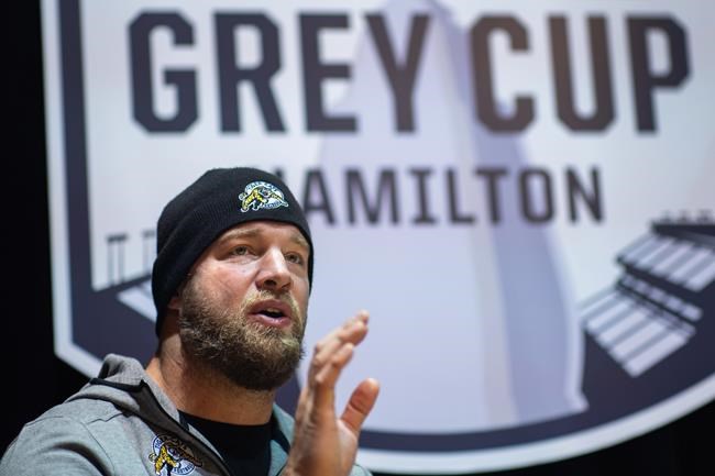 Hamilton Tiger-Cats offensive lineman Chris Van Zeyl (54) speaks to media at the Hamilton Convention Centre during the CFL's Grey Cup week in Hamilton, Thursday, December 9, 2021. The Hamilton Tiger-Cats will play the Winnipeg Blue Bombers in the 108th Grey Cup on Sunday. THE CANADIAN PRESS/Nick Iwanyshyn