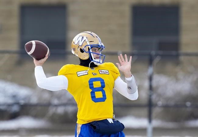 Winnipeg Blue Bombers quarterback Zach Collaros (8) throws the ball during practice ahead of the 108th CFL Grey Cup against the Hamilton Tiger-Cats in Hamilton, Ont., on December 8, 2021. THE CANADIAN PRESS/Nathan Denette