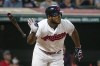 FILE - Cleveland Indians' Yasiel Puig watches his three-run double off of Philadelphia Phillies relief pitcher Cole Irvin during the seventh inning of a baseball game in Cleveland, Sept. 22, 2019. Former Major League Baseball outfielder Puig has signed a one-year, $1 million contact with South Korean club Kiwoom Heroes. (AP Photo/Phil Long, File)