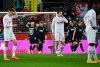 Augsburg's players celebrate scoring the first goal of the game during the German Bundesliga soccer match between 1. FC Cologne and FC Augsburg at the RheinEnergieStadion in Cologne, Germany, Friday, Dec. 10, 2021. (Federico Gambarini/dpa via AP)