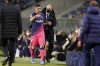 Atletico Madrid's Luis Suarez leaves the pitch after getting injured and being substituted during the Champions League Group B soccer match between FC Porto and Atletico Madrid at the Dragao stadium in Porto, Portugal, Tuesday, Dec. 7, 2021. (AP Photo/Luis Vieira)
