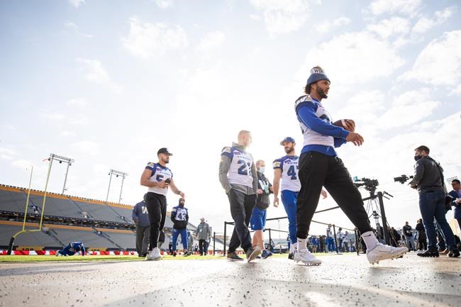 Players exit the field following Winnipeg Blue Bombers walkthrough at Tim Hortons Field during the CFL's Grey Cup week in Hamilton, Ont., Saturday, Dec. 11, 2021. The Hamilton Tiger-Cats will play the Winnipeg Blue Bombers in the 108th Grey Cup on Sunday. THE CANADIAN PRESS/Nick Iwanyshyn