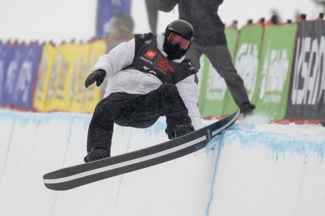 Shaun White, of United States, hits the lip of the halfpipe in the second run during halfpipe qualifying Thursday, Dec. 9, 2021, at the U.S. Grand Prix snowboarding event at Copper Mountain, Colo. (AP Photo/Hugh Carey)