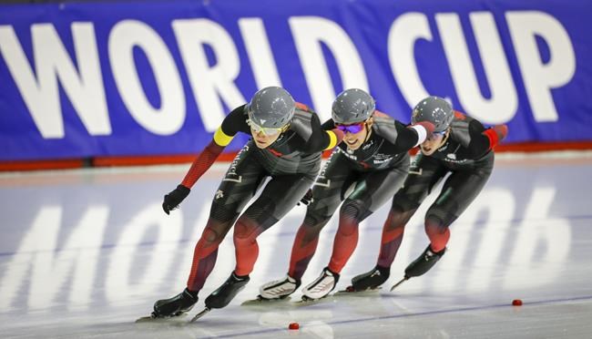 Canada's Isabelle Weidemann, left to right, leads teammates Valerie Maltais, and Ivanie Blondin to victory during the women's team pursuit at the ISU World Cup speed skating event in Calgary, Alta., Saturday, Dec. 11, 2021.THE CANADIAN PRESS/Jeff McIntosh