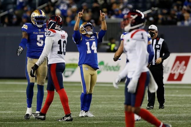 Winnipeg Blue Bombers kicker Sergio Castillo (14) celebrates against the Montreal Alouettes during the second half of CFL action in Winnipeg Saturday, November 6, 2021. THE CANADIAN PRESS/John Woods