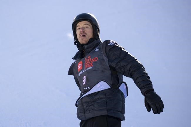 Shaun White, of United States, reacts after stumbling on his third run in the halfpipe finals Saturday, Dec. 11, 2021, during the U.S. Grand Prix snowboarding event at Copper Mountain, Colo. (AP Photo/Hugh Carey)