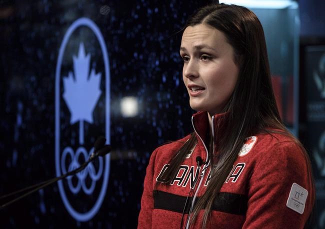 Marielle Thompson, of Whistler, B.C., answers questions after being named to the Canadian Olympic ski cross team in Calgary, Alta., Monday, Jan. 22, 2018. THE CANADIAN PRESS/Jeff McIntosh
