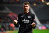 Frankfurt's Kristijan Jakic celebrates after scoring during the German Bundesliga soccer match between Eintracht Frankfurt and Bayer Leverkusen at the Deutsche Bank Park, in Frankfurt, Germany, Sunday, Dec. 12, 2021. (Arne Dedert/dpa via AP)