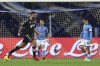 Empoli's Patrick Cutrone celebrates after scoring during the Serie A soccer match between Napoli and Empoli, at the Naples Diego Armando maradona stadium, Italy, Sunday, Dec. 12, 2021. (Alessandro Garofalo/LaPresse via AP)