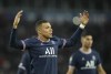 PSG's Kylian Mbappe celebrates after scoring his side's second goal during the French League One soccer match between Paris Saint-Germain and Monaco at the Parc des Princes stadium in Paris, France, Sunday, Dec. 12, 2021. (AP Photo/Christophe Ena)