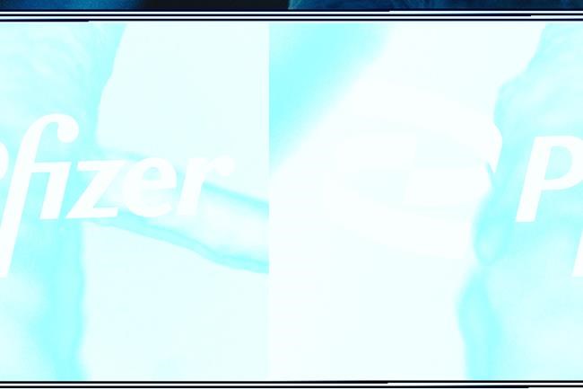 FILE - The Pfizer logo is displayed at the company's headquarters, Feb. 5, 2021, in New York. Pfizer is spending $6.7 billion to buy a drugmaker with no products on the market and a focus on developing treatments for inflammatory conditions like Chrohn’s disease. The pharmaceutical giant said Monday, Dec. 13, 2021 it will pay $100 in cash for each share of Arena Pharmaceuticals in a deal already approved by the boards of both companies.(AP Photo/Mark Lennihan, File)