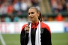 FILE - Portland Thorns forward Alex Morgan speaks to the crowd before their NWSL soccer match against the Seattle Reign in Portland, Ore., July 22, 2015. Morgan is returning to her home state, joining the San Diego Wave of the National Women’s Soccer League for the team's first season. The move to Southern California reunites Morgan with Wave President Jill Ellis, who coached Morgan to a pair of back-to-back World Cup titles. Morgan has been with the NWSL since its inception, playing for the Portland Thorns and Orlando Pride before joining San Diego. (AP Photo/Don Ryan, file)