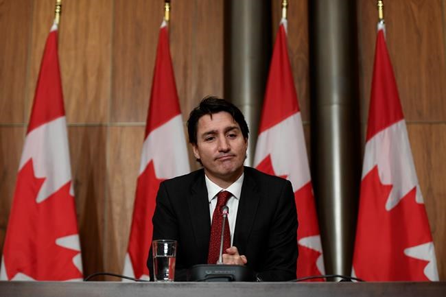 Prime Minister Justin Trudeau listens to questions in Ottawa, on Monday, Dec. 13, 2021. THE CANADIAN PRESS/Justin Tang