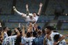 Teammates lift Argentina's Lionel Messi after beating Brazil 1-0 in the Copa America final soccer match at the Maracana stadium in Rio de Janeiro, Brazil, July 10, 2021. (AP Photo/Bruna Prado)