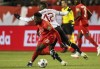 Team Canada's Alphonso Davies (19) makes a move on Costa Rica's Joel Nathaniel Campbell Samuels (12) during first half World Cup qualifier soccer action in Edmonton on November 12, 2021. THE CANADIAN PRESS/Jason Franson