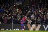Crystal Palace's Jordan Ayew, left, celebrates scoring during the English Premier League soccer match between Crystal Palace and Southampton at Selhurst Park, London, Wednesday Dec. 15, 2021. (Adam Davy/PA via AP)