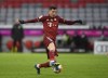 Bayern's Robert Lewandowski controls the ball during a German Bundesliga soccer match between Bayern Munich and FSV Mainz 05 at the Allianz Arena in Munich, Germany, Saturday, Dec. 11, 2021. (AP Photo/Andreas Schaad)