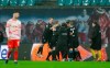 Bielefeld players celebrate scoring during the Bundesliga soccer match between RB Leipzig and Arminia Bielefeld in Leipzig, Germany, Saturday, Dec. 18, 2021. (Jan Woitas/dpa via AP)