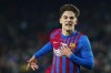 Barcelona's Gavi celebrates after scoring his side's second goal during the Spanish La Liga soccer match between Barcelona and Elche at the Camp Nou stadium, in Barcelona, Spain, Saturday, Dec. 18, 2021. (AP Photo/Joan Monfort)