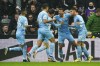 Manchester City's Ruben Dias, second right, celebrates scoring their side's first goal of the game during the English Premier League soccer match between Newcastle and Manchester City at St. James' Park, Newcastle, England, Sunday, Dec. 19, 2021. (Owen Humphreys/PA via AP)