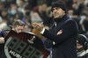 Lyon's head coach Peter Bosz reacts during the Europa League Group A match between Lyon and Rangers at the Groupama stadium in Lyon, France, Thursday, Dec. 9, 2021. (AP Photo/Laurent Cipriani)