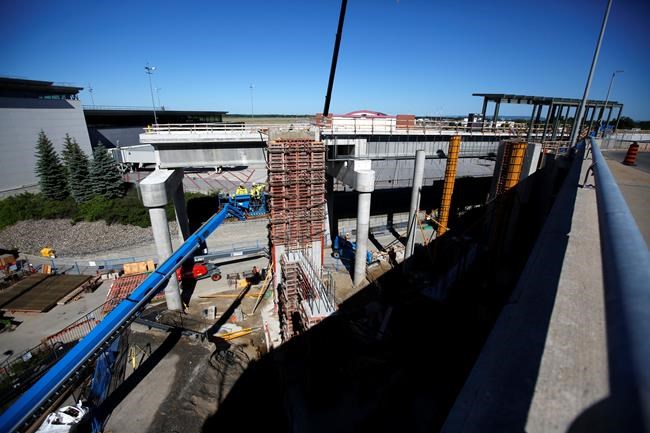 Construction of the future LRT line is visible from the departures level of the Ottawa MacDonald-Cartier International Airport on Wednesday, June 16, 2021.The high cost of Canadian light rail compared to our European counterparts is often chalked up to weather concerns and construction costs. THE CANADIAN PRESS/David Kawai