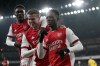 Arsenal's Eddie Nketiah, right, celebrates after scoring the opening goal during the English League Cup quarterfinal soccer match between Arsenal and Sunderland at Emirates stadium in London, Tuesday, Dec. 21, 2021. (AP Photo/Kirsty Wigglesworth)