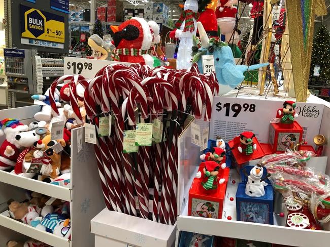 Candy canes and music boxes stand on a holiday display in a Lowe's store Friday, Oct. 2, 2020, in Northglenn, Colo. Candy canes and other festive sweets are harder to find this year due to supply chain challenges affecting the food industry. THE CANADIAN PRESS/HO-AP/David Zalubowski