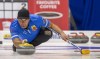 Team Bottcher third Darren Moulding throws against team Horgan during Draw 4 of the 2021 Canadian Olympic curling trials in Saskatoon, Sask., Sunday, Nov. 21, 2021. THE CANADIAN PRESS/Liam Richards