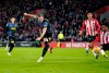 Tottenham Hotspur's Harry Kane scores his side's second goal during the English Premier League soccer match between Southampton and Tottenham Hotspur, at St. Mary's Stadium, Southampton, England, Tuesday, Dec. 28, 2021. (Andrew Matthews/PA via AP)