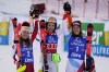 Winner, Slovakia's Petra Vlhova , center, is flanked by second place Austria's Katharina Liensberger , let and third place Switzerland's Michelle Gisin on the podium after an alpine ski women's World Cup slalom race, in Lienz, Austria, Wednesday, Dec. 29, 2021. (AP Photo/Marco Tacca)