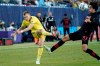 Nashville SC defender Alistair Johnston (12) takes a shot past New York Red Bulls midfielder Caden Clark (37) during the second half of an MLS soccer match Sunday, Nov. 7, 2021, in Nashville, Tenn. THE CANADIAN PRESS/AP/Mark Humphrey