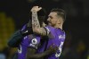 Tottenham's Davinson Sanchez, left, celebrates with Tottenham's Pierre-Emile Hojbjerg at the end of the English Premier League soccer match between Watford and Tottenham Hotspur at Vicarage Road, Watford, England, Saturday, Jan. 1, 2022. (AP Photo/Rui Vieira)
