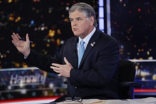FILE - In this Aug. 7, 2019, photo, Fox News host Sean Hannity speaks during a taping of his show, 