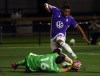 Pacific FC's Terran Campbell tries to score on Vancouver Whitecaps goalie Maxime Crepeau during second half Canadian Championship Preliminary Round soccer action at Starlight Stadium in Langford, B.C., on Thursday, August 26, 2021. THE CANADIAN PRESS/Chad Hipolito