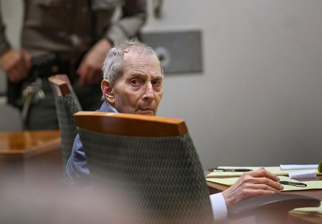 FILE - Real estate heir Robert Durst sits during his murder trial at the Airport Branch Courthouse in Los Angeles on Thursday, March 5, 2020. Durst, the wealthy New York real estate heir and failed fugitive who was dogged for decades with suspicion in the disappearance and deaths of those around him before he was convicted of killing his best friend and sentenced to life in prison, died on Monday, Jan. 10, 2022. He was 78. (Robyn Beck/AFP via AP, Pool, File)