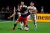 Inter Miami midfielder Jay Chapman (14) pulls the jersey of New England Revolution forward Adam Buksa (9) during the second half of an MLS soccer match&nbsp;in Fort Lauderdale, Fla., Wednesday, July 21, 2021.&nbsp;Chapman has signed with Scotland's Dundee FC. THE CANADIAN PRESS/AP-Jim Rassol