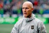 In this March 4, 2018, file photo, Los Angeles head coach Bob Bradley walks on the pitch before an MLS soccer match against the Seattle Sounders in Seattle. THE CANADIAN PRESS/AP/Ted S. Warren
