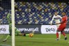 Fiorentina's Lorenzo Venuti, second right, scores during the Italian Cup, round of 16 soccer match between Napoli and Fiorentina, at the Diego Armando Maradona stadium in Naples, Italy, Thursday, Jan. 13, 2022. (Alessandro Garofalo/LaPresse via AP)