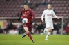 Bayern's Robert Lewandowski controls the ball during the German Bundesliga soccer match between FC Cologne and Bayern Munich in Cologne, Germany, Saturday, Jan. 15, 2022. (AP Photo/Martin Meissner)