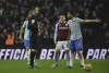 Manchester United's Bruno Fernandes appeals to the referee David Coote during the English Premier League soccer match between Aston Villa and Manchester United at Villa Park in Birmingham, England, Saturday, Jan. 15, 2022. (AP Photo/Rui Vieira)