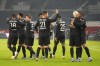 PSG's Kylian Mbappe, right, celebrates with teammates after scoring the opening goal during the French League One soccer match between Paris Saint Germain and Brest at the Parc des Princes in Paris, Saturday, Jan. 15, 2022. (AP Photo/Michel Euler)