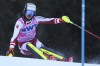 Austria's Manuel Feller speeds down the course of an alpine ski, men's World Cup slalom race, in Wengen, Switzerland, Sunday, Jan. 16, 2022. (AP Photo/Luciano Bisi)