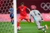 Canada's Christine Sinclair (12) scores a goal against Japan at the 2020 Summer Olympics, Wednesday, July 21, 2021, in Sapporo, Japan.&nbsp;The world governing body of soccer honoured Canada captain Christine Sinclair on Monday for her record goal-scoring. THE CANADIAN PRESS/AP-Silvia Izquierdo
