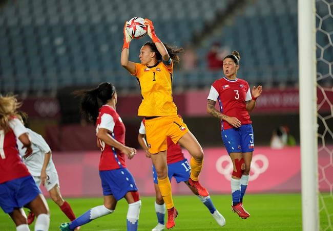 Chile's goalkeeper Christiane Endler saves a ball during a women's soccer match against Japan at the 2020 Summer Olympics, Tuesday, July 27, 2021, in Rifu, Japan. THE CANADIAN PRESS/AP Photo-Andre Penner