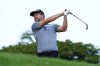 Webb Simpson plays his shot from the 11th tee during the Sony Open golf tournament pro-am event, Wednesday, Jan. 12, 2022, at Waialae Country Club in Honolulu. (AP Photo/Matt York)