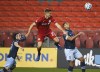 Toronto FC midfielder Liam Fraser (27) battles for the loose ball against Vancouver Whitecaps defender Ali Adnan (53) during second half MLS Canadian Championship soccer action in Toronto on Friday, August 21, 2020. THE CANADIAN PRESS/Nathan Denette