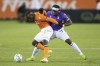 Pacific FC forward Kunle Dada-Luke (right) battles for a ball with Forge FC defender Kwame Awuah (left) during Canadian Premier League championship game action at Tim Hortons Field in Hamilton, Ont., Sunday, Dec. 5, 2021. THE CANADIAN PRESS/NICK IWANYSHYN