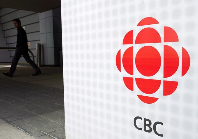 A man leaves the CBC building in Toronto on Wednesday, April 4, 2012. Carol Off, the co-host of CBC Radio One's