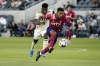FILE - FC Dallas forward Jesús Ferreira controls the ball against Los Angeles FC during the first half of an MLS soccer match June 23, 2021, in Los Angeles. Ferreira has agreed to a four-year contract with Dallas. The deal announced Tuesday, Jan. 18, 2022, for the 21-year-old forward includes a club option for 2026. He will occupy a young designated player spot on the roster, which allows players 21-23 years old to have only $200,000 per season count toward the salary cap. (AP Photo/Marcio Jose Sanchez, File)